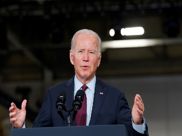Biden, Harris urge Americans to protect democracy on Capitol attack anniversary