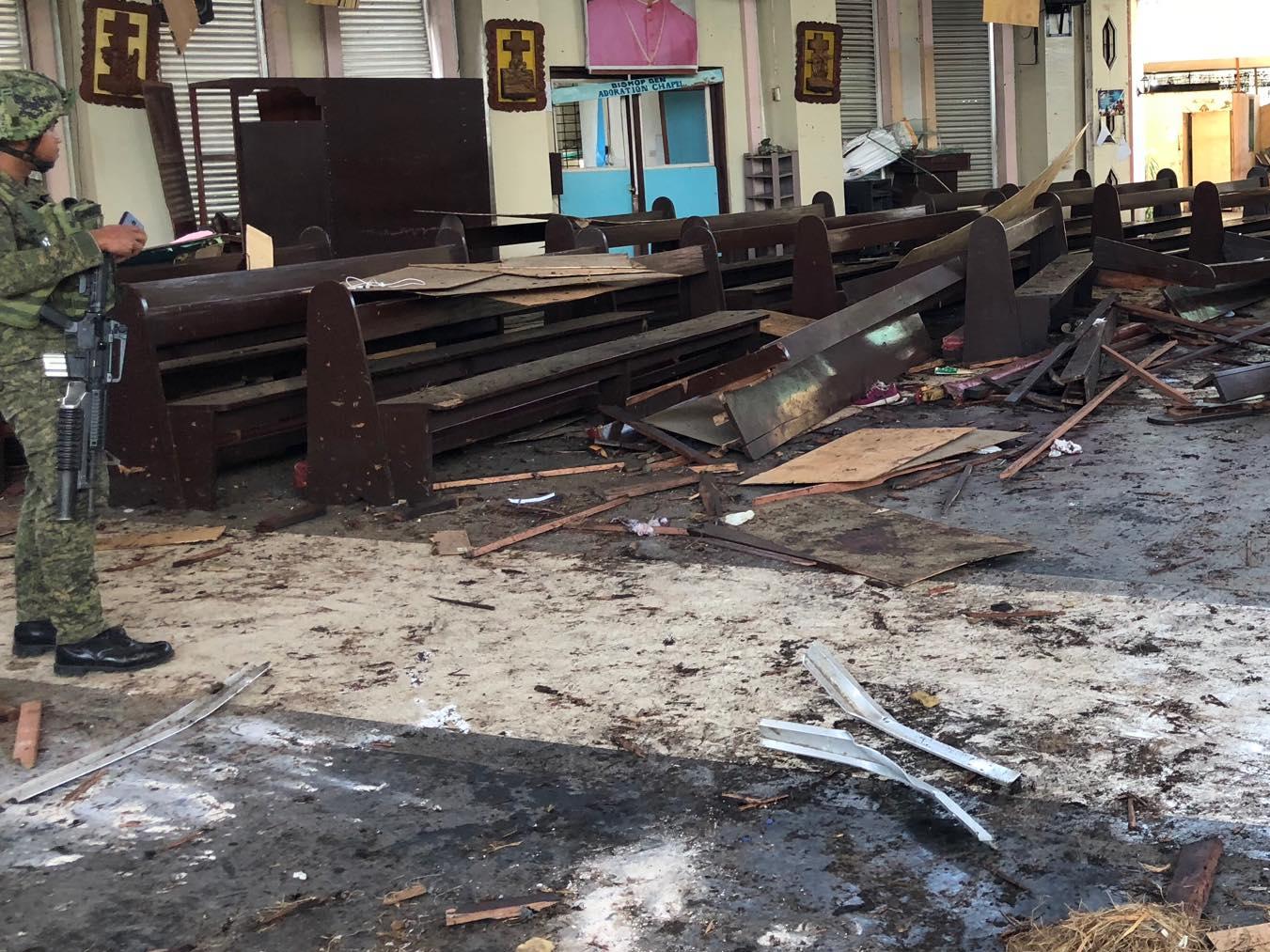 Philippines interior minister says, Indonesian couple behind church attack on 27 Jan