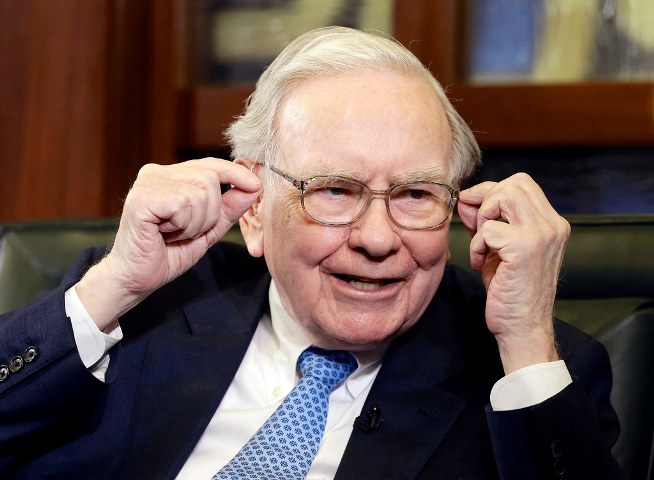 WRAPUP 4-Buffett defends Berkshire stock push, reassures on future as profit smashes record