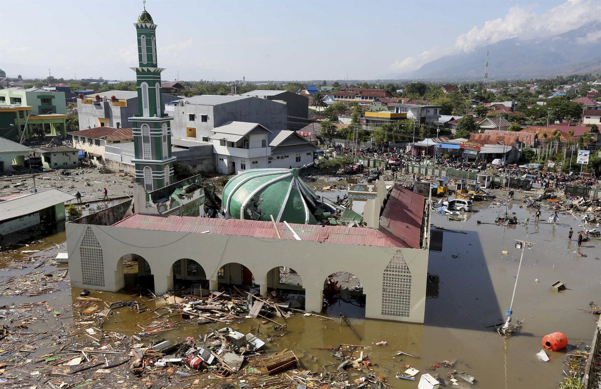 UPDATE 3-Lights back on in Indonesian quake city, but fate of thousands unknown