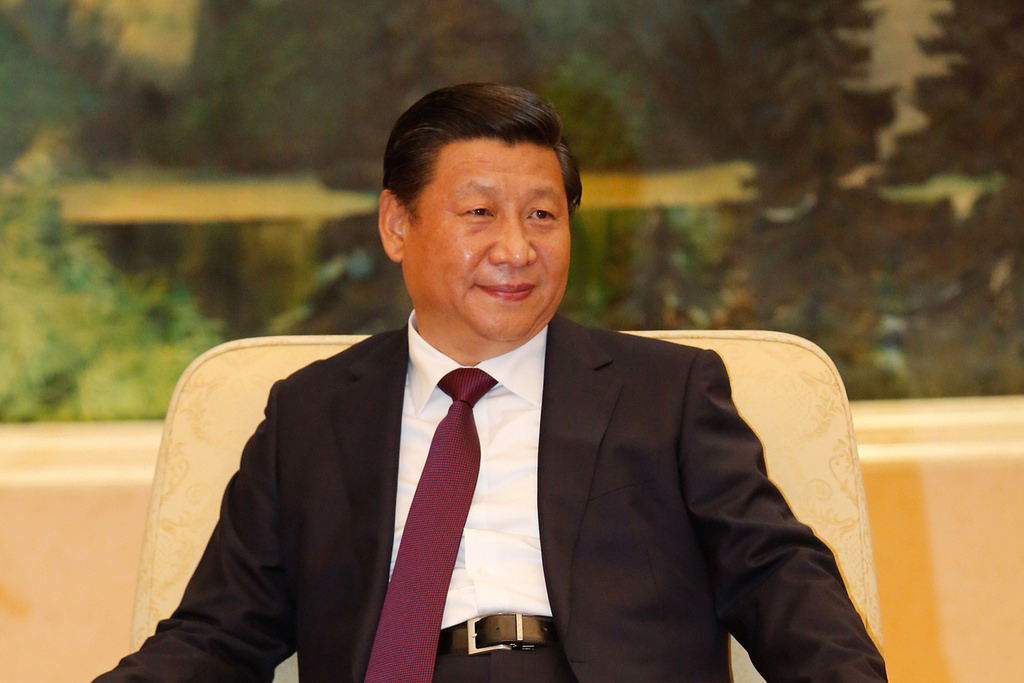 People on both sides of Taiwan Strait should seek "reunification": Xi