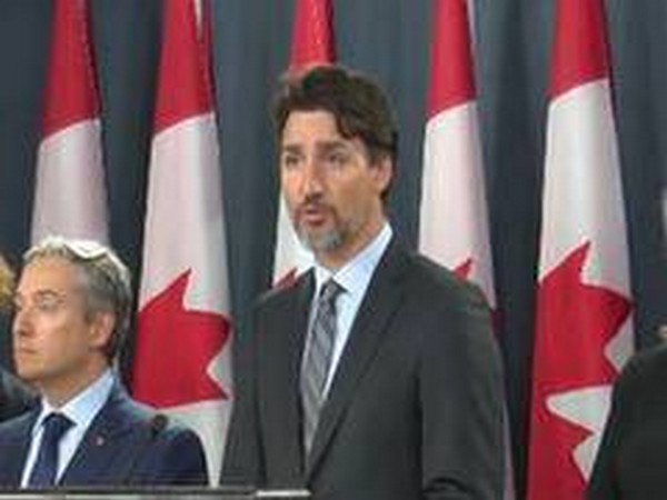 Canada's Trudeau in isolation after COVID exposure; says test negative