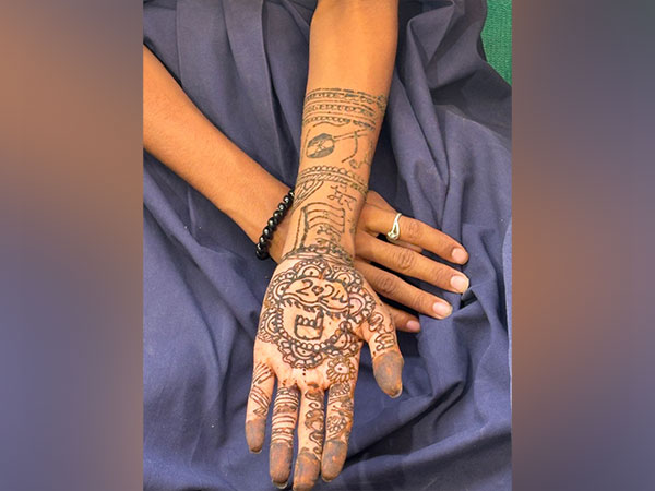 Swirls of support: Ahmedabad youngsters use mehendi to muster momentum for voter awareness