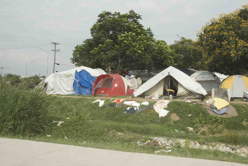 FEATURE-U.S. cities push the homeless to live in tent camps