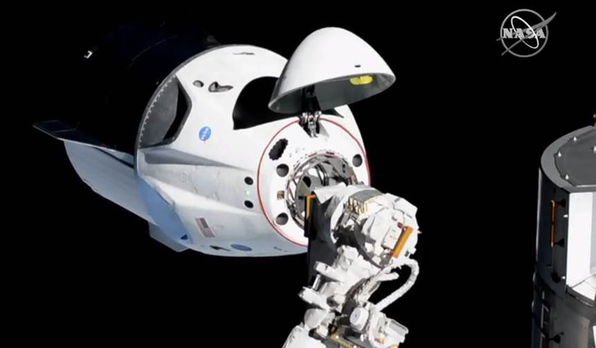 SpaceX capsule with NASA astronauts streaking toward Earth