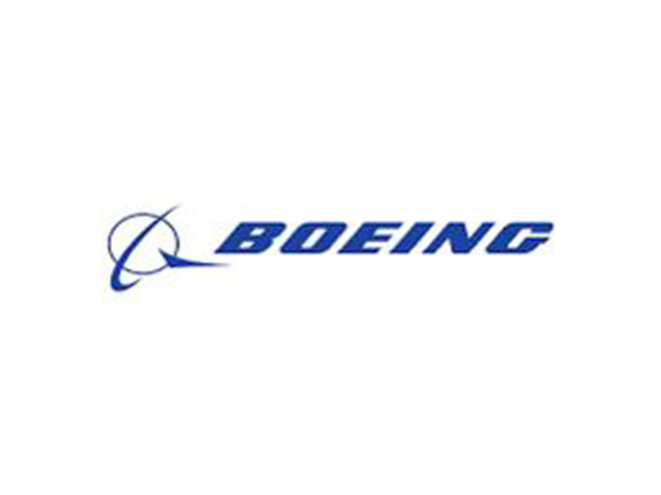Boeing posts adjusted loss, sticks to cash-flow goal
