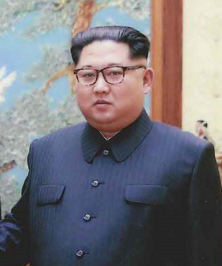 UPDATE 4-N.Korea's Kim inspects new submarine, signals possible ballistic missile development