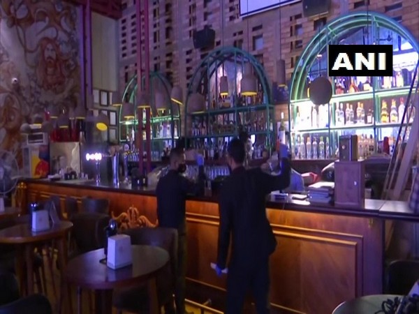 Karnataka: Footfall increases as pubs serve liquor again