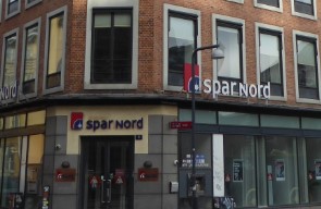 UPDATE 1-Spar Nord becomes third Danish bank to adopt negative interest on deposits