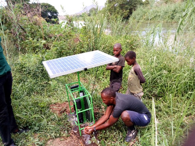 FEATURE-Solar-pumped water slakes rural Kenya's thirst for development