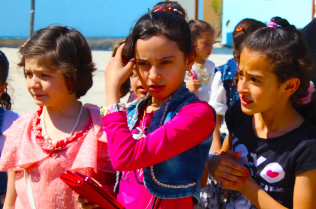 Mobile cinema brings movie magic to Syria Kurd children