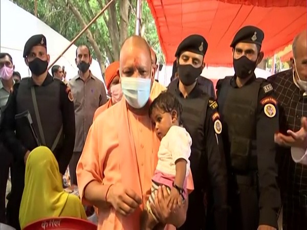 Adityanath meets flood victims, distributes relief material in UP's Siddharthnagar