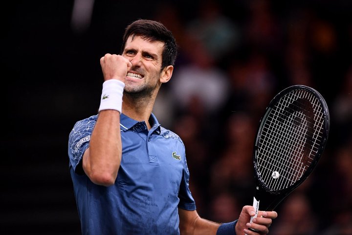 Novak Djokovic gets through Medvedev test to reach last 8 in Australian Open