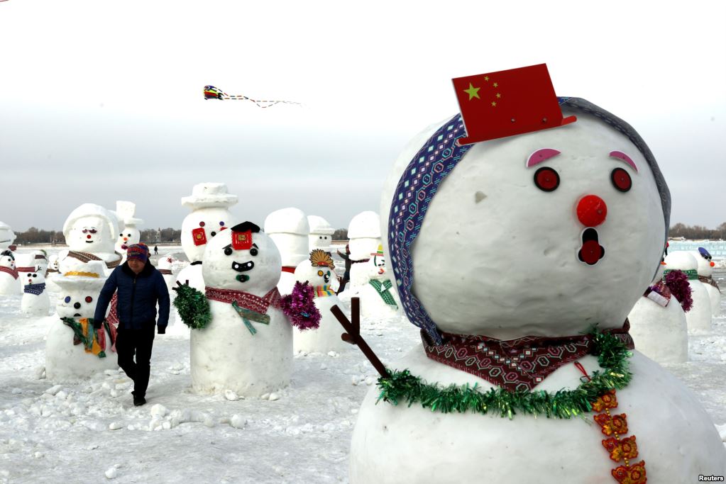 Chinese Harbin city host winter festival, visitors gather around Songhua river