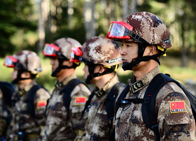 EXCLUSIVE-China's PLA signals it will keep Hong Kong-based troops in barracks