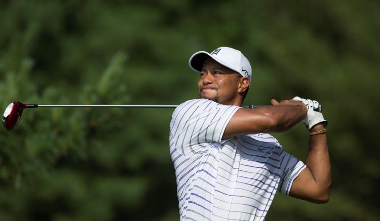 Tiger Woods shares lead as weather delays new Japan US PGA Tour event