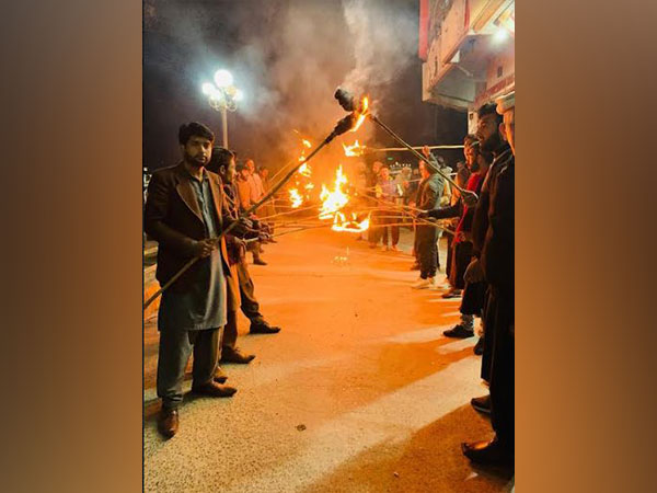 PoK: Jammu Kashmir Joint Awami Action Committee holds torch-wielding protest against Pakistan administration