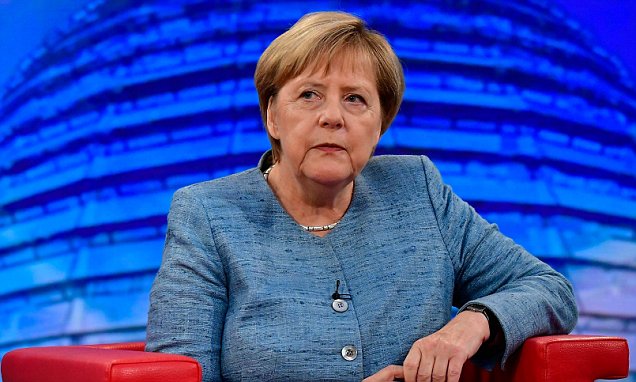 Merkel's six-month-old government hanging in balance