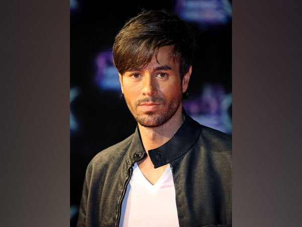 enrique iglesias song about love in spanish