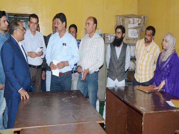 J-K Assembly Speaker interacts with staff after reopening of assembly secretariat