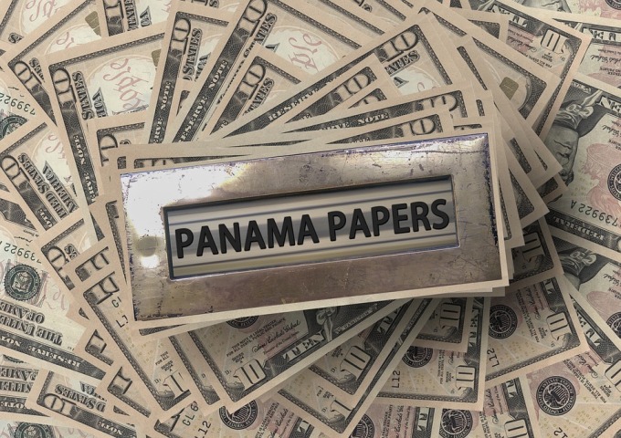UPDATE 2-U.S. charges four in 'Panama Papers' tax evasion scheme