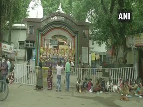 Devotees offer prayers outside Ranchi's Pahari Mandir as temple remains closed on first Monday of Sawan
