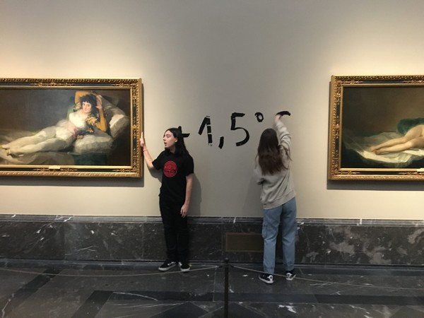 Climate activists glue themselves to Goya paintings in Madrid's Prado Museum