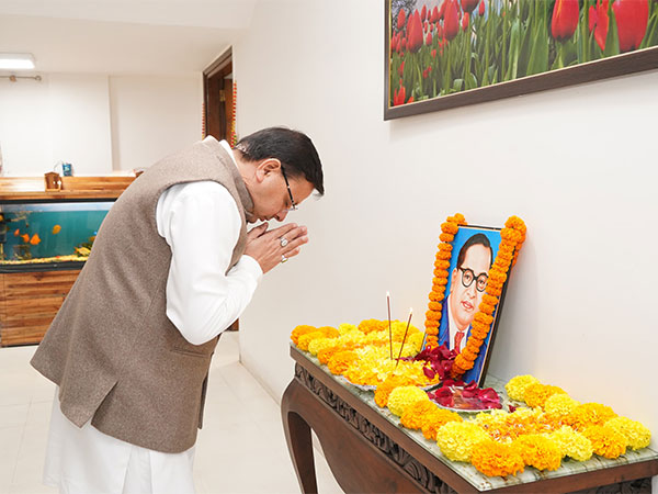 Uttarakhand CM Dhami pays floral tribute to Dr BR Ambedkar at his residence