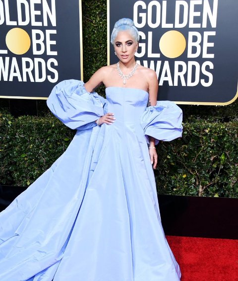 UPDATE 1-Lady Gaga goes old-school on color-filled Golden Globes red carpet