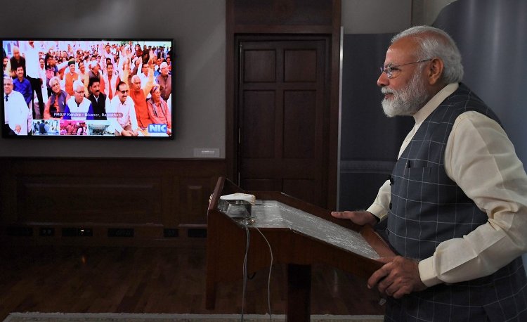 PM Modi interacts with PMBJP beneficiaries, store owners through video conference