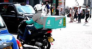 UK's Waitrose expands rapid home deliveries with Deliveroo