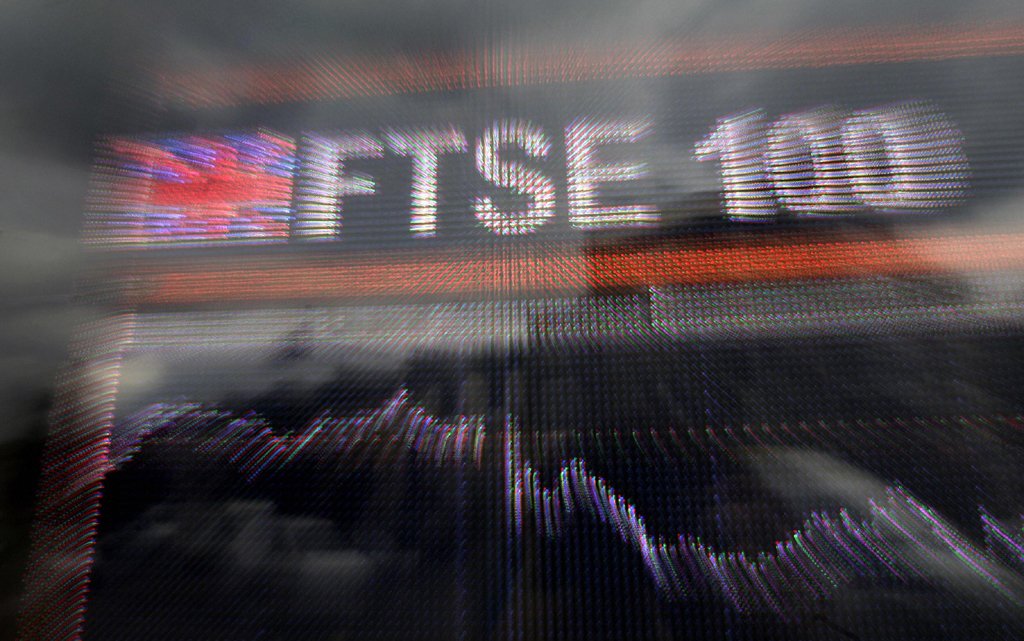 UPDATE 1-Sky, Randgold surge on deals while trade war weighs on FTSE 100