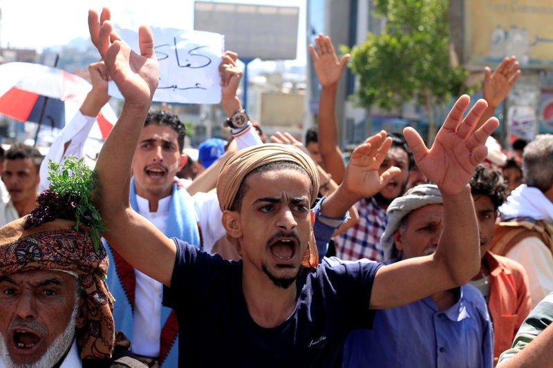 UPDATE 2-Yemen's Houthis arrest protesters in Sanaa