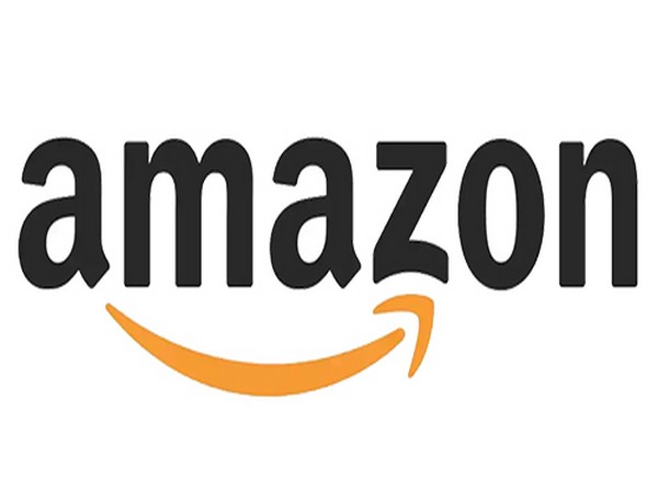 UPDATE 2-Amazon drops grocery delivery fee as competitors close in