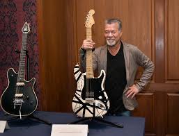 Eddie Van Halen, guitar god in rock band named after him, dies at 65