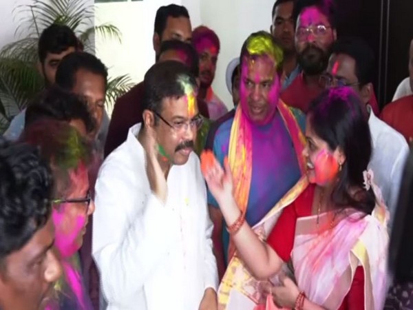 Union Minister Dharmendra Pradhan celebrates Holi at his residence