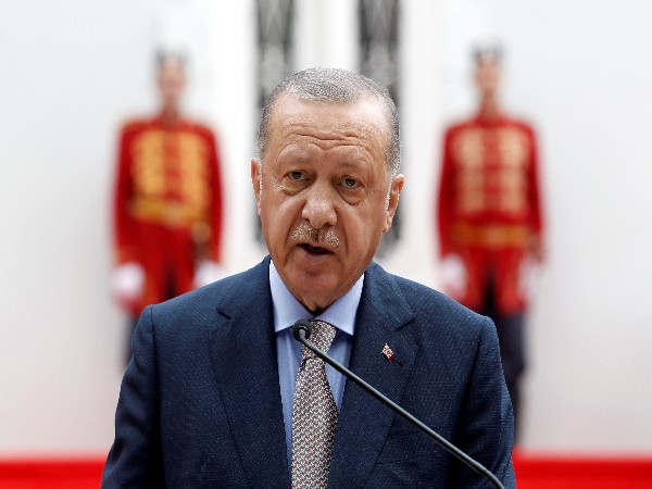 Erdogan asks Turks to trust government over new economic model
