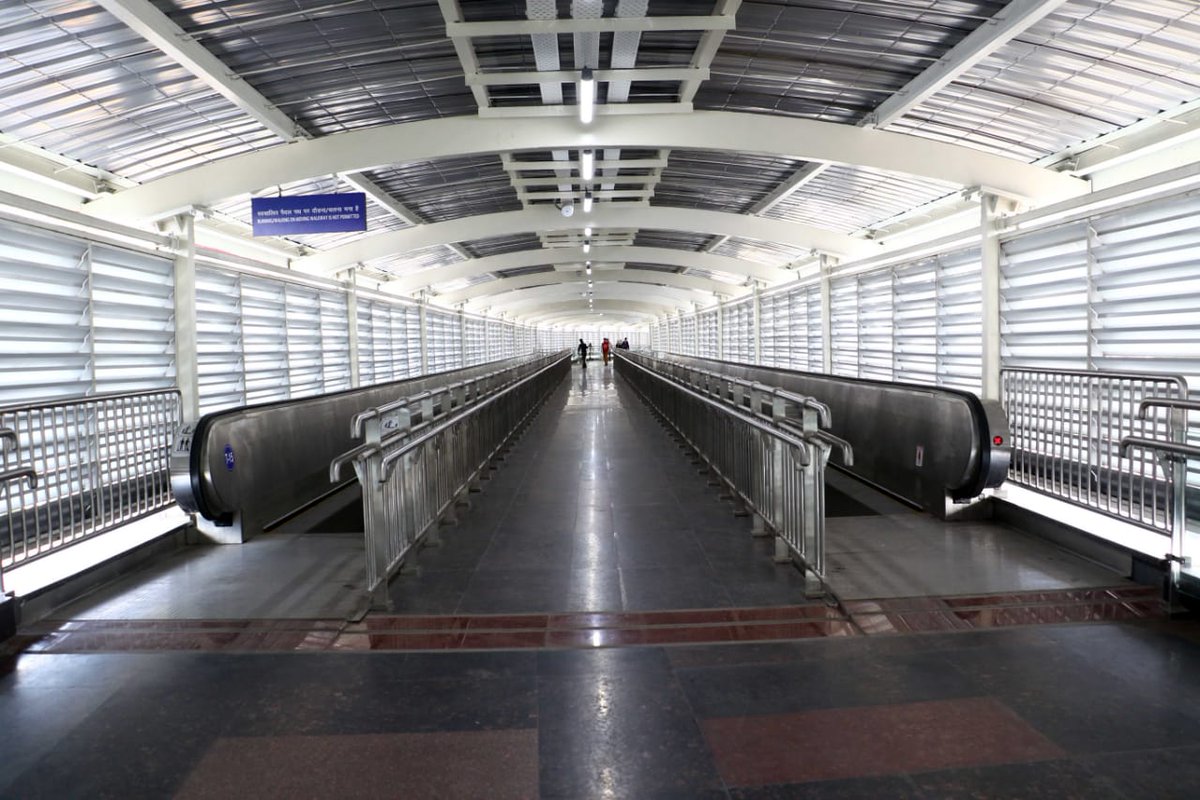 Pink Line and Airport Line linked with foot-overbridge consisting of 22 travelators