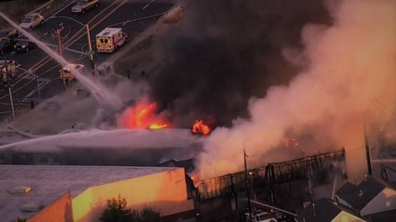 Watch: Huge fire at warehouse in Oakland with thick black smoke rising 