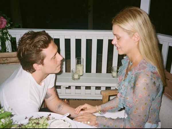 Brooklyn Beckham displays gold band on his ring finger weeks after proposing to fiancee Nicola Peltz