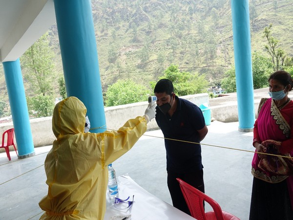People coming from different States to Uttarakhand undergo thermal screening, health check-up 