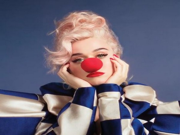 Katy Perry wears clown nose in new album cover of 'Smile'