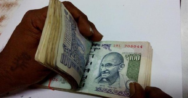Rupee trims some losses, down 15 paise against USD