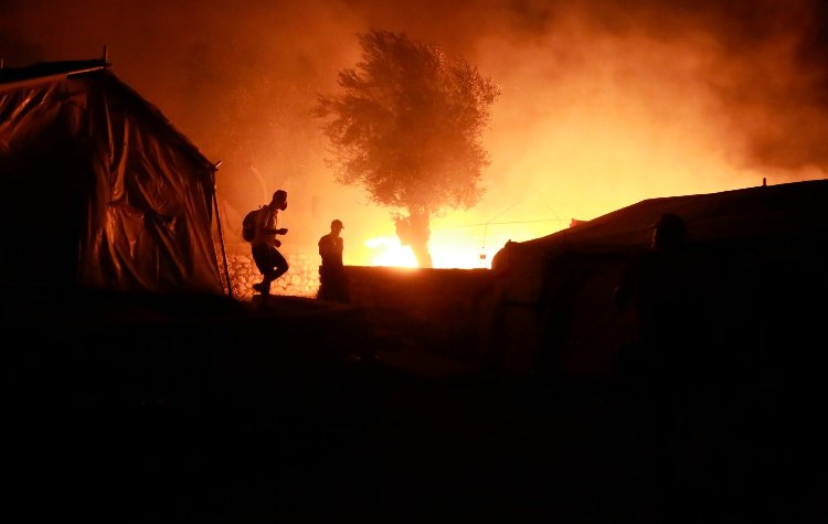New fires at Greek island refugee camp destroy last remaining shelters

