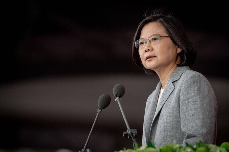 UPDATE 1-Taiwan tells China to use peaceful means to resolve differences