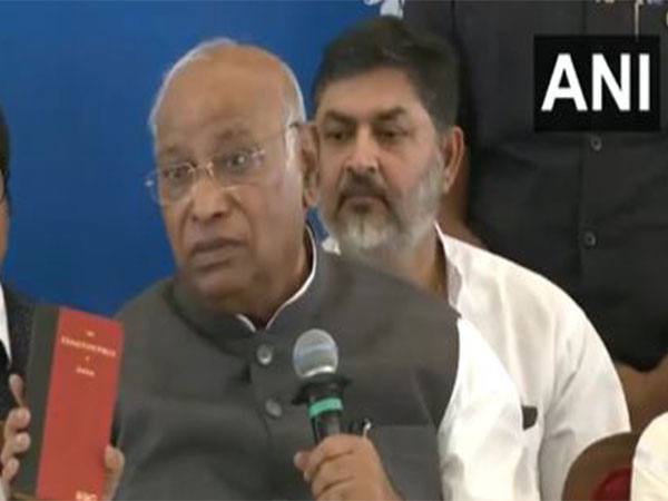 Kharge Challenges Modi's 'Laal Kitab' Critique Amid Constitution Controversy