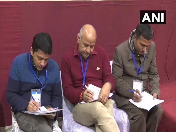 Sisodia, BJP's Ravi Negi at Akshardham centre as counting of votes continues