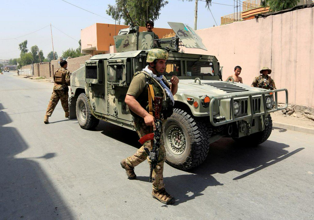 Three policemen, two civilians killed in Afghanistan police station attack