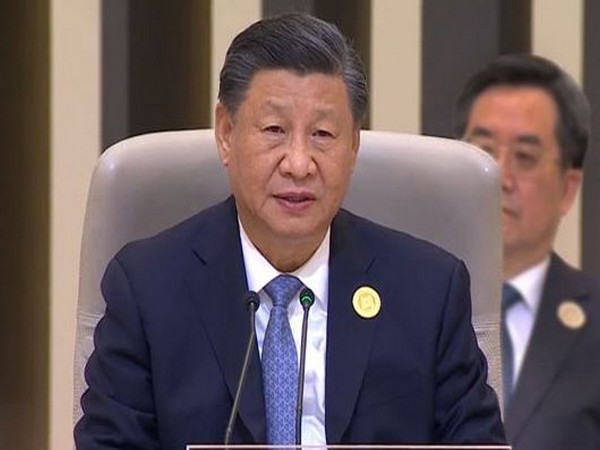 China's Xi meets Uruguay president, upgrades ties 