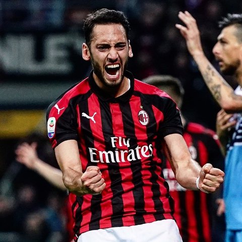 Soccer-Rare Calhanoglu goal keeps Milan in Champions League hunt